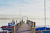 A jetty at dawn in Allensbach on Lake Constance