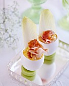 Eggs with chicory, Parmesan cheese and Parma ham