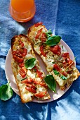 Pizza baguette with tomatoes and mozzarella
