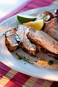 Grilled pork steak with a lime and mint sauce