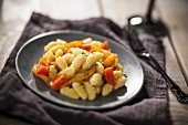 Gnocchi with peppers and tomatoes