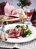Roast ham with broccoli and pomegranate seeds for Christmas
