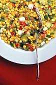 Sweet corn salad with courgettes and feta cheese