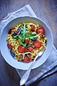 Fettuccini with tomatoes, aubergines and rocket
