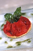 Tartlet with tomato confit with fried basil