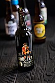 A bottle of Kröger's Dark Stag Imperial Stout (craft beer from an artisan brewery)