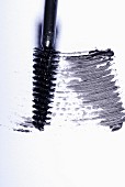 Black mascara on a white surface