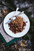 Pork stew with gingerbread, raisins and cinnamon for Christmas