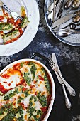 Ricotta dumplings with spinach in tomato sauce
