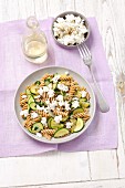 Wholemeal pasta with courgette and feta cheese