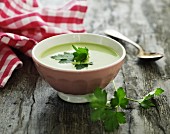 Cream of pea soup garnished with parsley