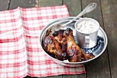 Grilled chicken drumsticks and cucumber raita