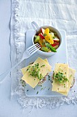 Herb rolls with cheese and fruit salad