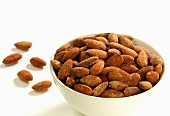 A bowl of sweet roasted almonds