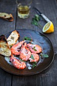 Poached prawns with capers, sweet aioli and grilled bread