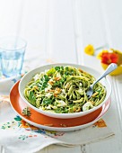 Spaghetti with pesto and feta cheese