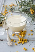 Hot milk with sea buckthorn syrup