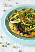 Frittata with asparagus, smoked salmon and peas