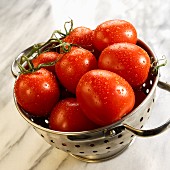 Fresh tomatoes in colander