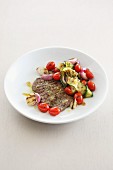 Organic steak with a tomato and cucumber salad