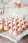 Pink lollipops for a wedding buffet
