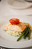 Salmon fillet on rice with green beans