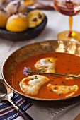 Spicy tomato soup with lamb dumplings