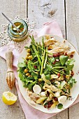 Lemon, olive and artichoke salad with chicken breast