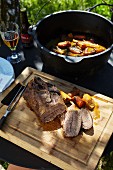 Braised roast pork with vegetables from a Dutch oven