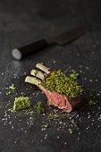 Milk-fed rack of lamb with a herb crust and herb butter