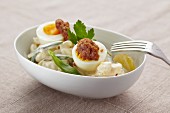 Potato salad with eggs and beans