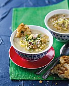 Chicken soup with vegetables and crispy baguette
