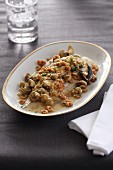 Sole with a seafood and mushroom sauce