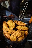 Falafel in a rustic sieve at a market in Bethlehem