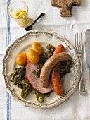 Kale with sausages, smoked pork chops and potatoes