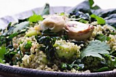 Quinoa salad with spring onions, grilled garlic, celery, coriander, parsley and herbs