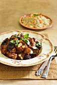 Lamb tagine with plums and couscous