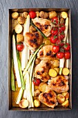 Roast chicken bits with asparagus, cherry tomatoes and potatoes