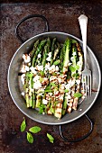 Grilled green asparagus with feta cheese and balsamic vinegar