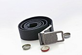 A belt with a bottle opener buckle