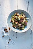 Swiss meat salad with a duo of cucumbers and caraway croutons