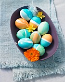 Easter eggs dyed blue and orange