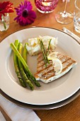 Tuna fish steak with green asparagus and mashed potatoes