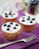Cupcakes with sugared blueberries