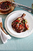 Chicken leg with vegetables and red wine sauce