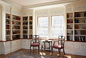 Elegant library with fine stucco ceiling