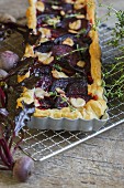 Beetroot quiche with feta cheese and thyme
