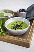 Pea and coconut soup with mint and daikon radishes