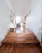 Antique furniture and old wooden floor in foyer