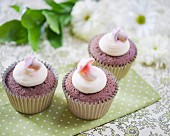 Chocolate cupcakes decorated with mushroom sweets